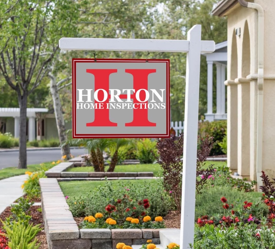 Horton Home Inspections yard sign in front of a landscaped home